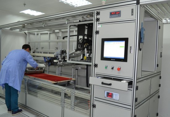 Intertek technician is operating dust-removal ability test equipment